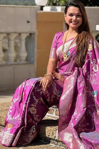 Onion pink elegant art silk woven saree with rich zari border