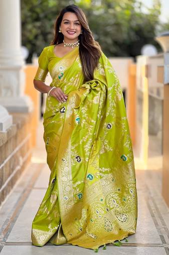 Green elegant art silk woven saree with rich zari border