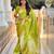 Green elegant art silk woven saree with rich zari border