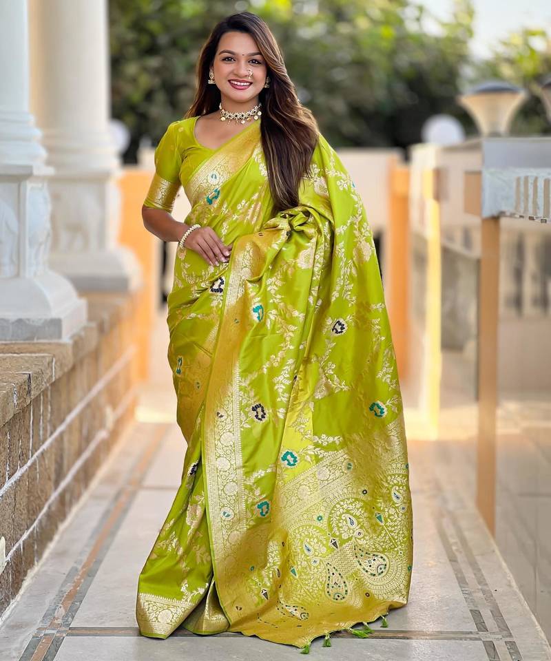 Green elegant art silk woven saree with rich zari border