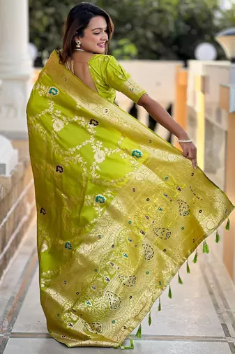 Green elegant art silk woven saree with rich zari border