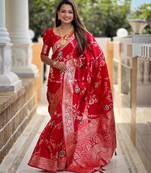 Red elegant art silk woven saree with rich zari border
