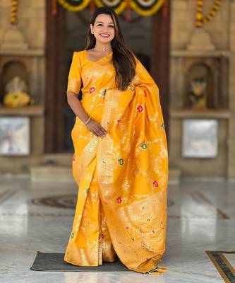 Yellow elegant art silk woven saree with rich zari border 1