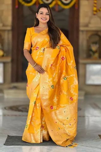 Yellow elegant art silk woven saree with rich zari border