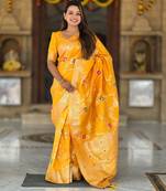 Yellow elegant art silk woven saree with rich zari border