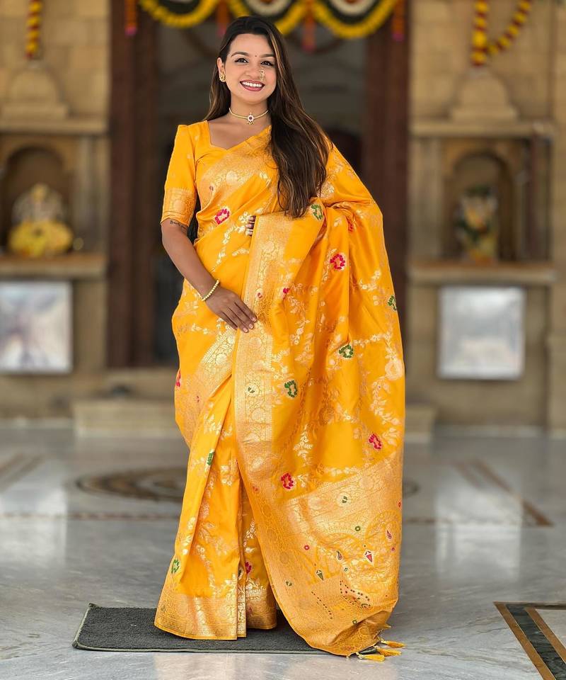 Yellow elegant art silk woven saree with rich zari border