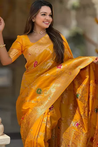 Yellow elegant art silk woven saree with rich zari border