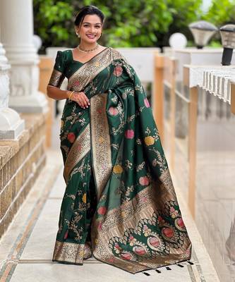 Green elegant art silk woven saree with rich zari border 1