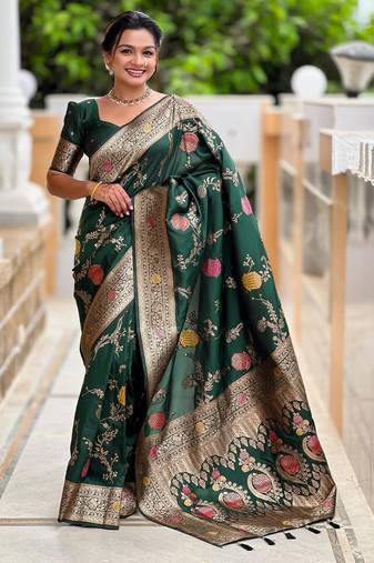 Green elegant art silk woven saree with rich zari border