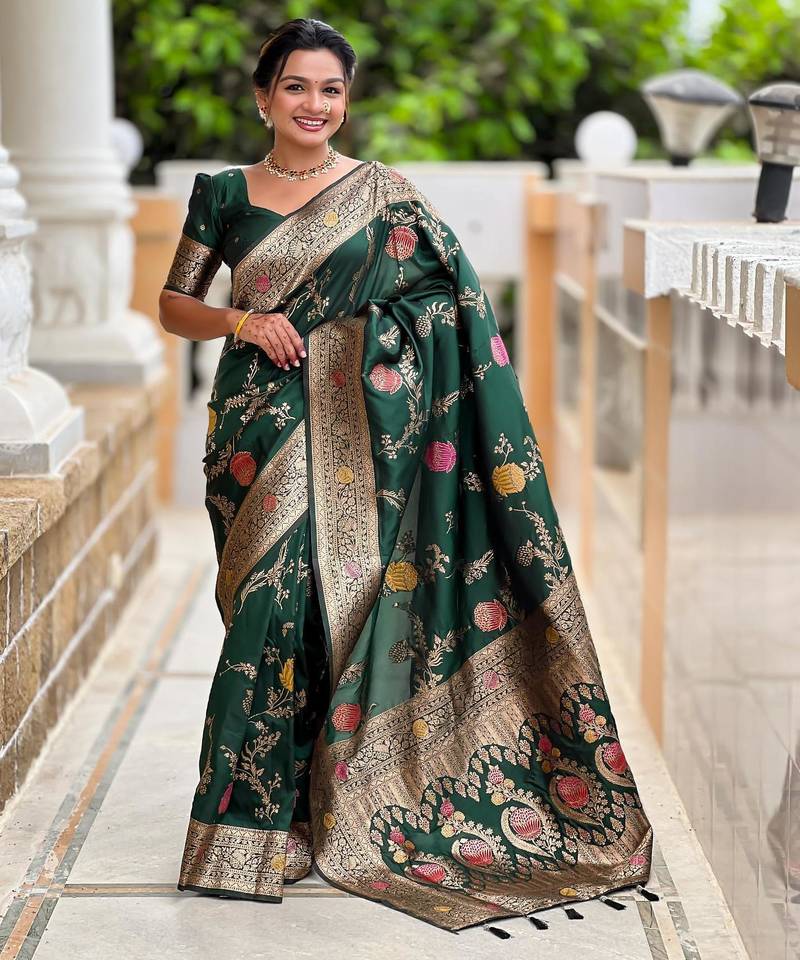 Green elegant art silk woven saree with rich zari border