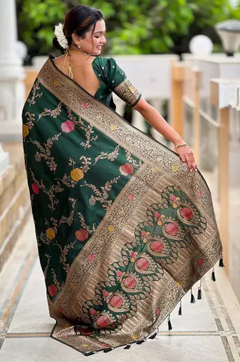 Green elegant art silk woven saree with rich zari border