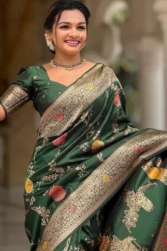 Green elegant art silk woven saree with rich zari border