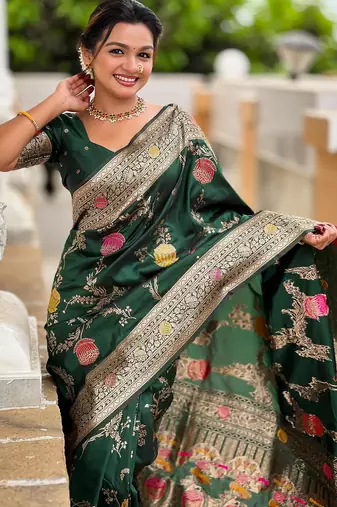 Green elegant art silk woven saree with rich zari border