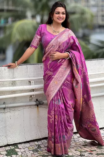 Onion pink elegant art silk woven saree with rich zari border