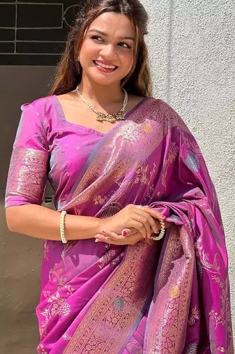 Onion pink elegant art silk woven saree with rich zari border