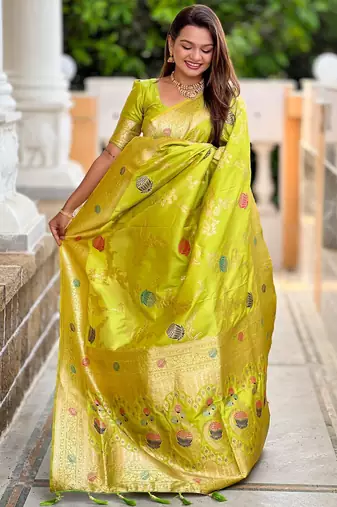 Green elegant art silk woven saree with rich zari border