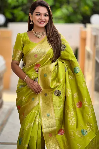 Green elegant art silk woven saree with rich zari border