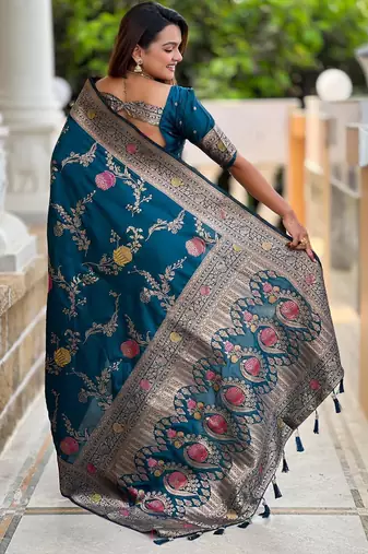 Teal elegant art silk woven saree with rich zari border