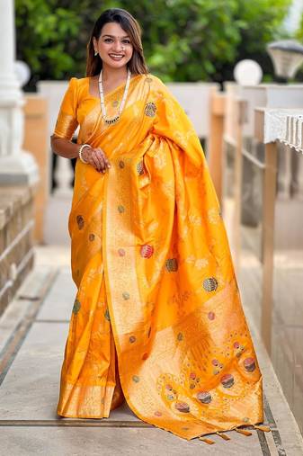 Yellow elegant art silk woven saree with rich zari border