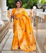Yellow elegant art silk woven saree with rich zari border