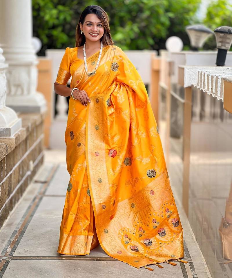 Yellow elegant art silk woven saree with rich zari border