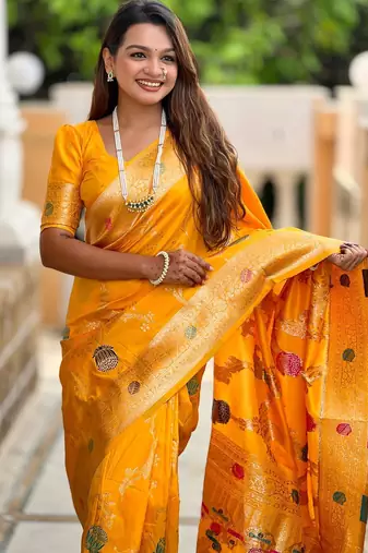 Yellow elegant art silk woven saree with rich zari border