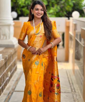 Yellow elegant art silk woven saree with rich zari border 4