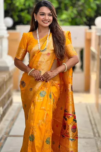 Yellow elegant art silk woven saree with rich zari border