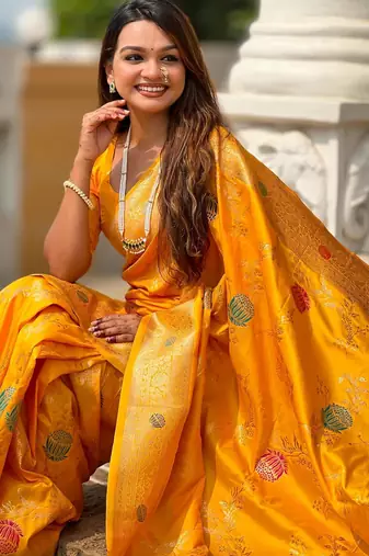 Yellow elegant art silk woven saree with rich zari border