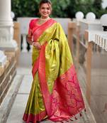Green elegant art silk woven saree with rich zari border