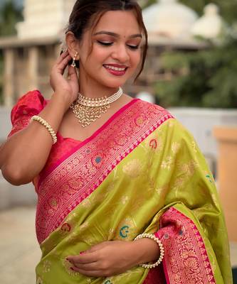 Green elegant art silk woven saree with rich zari border 3