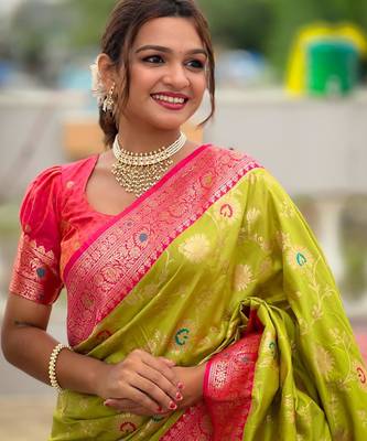 Green elegant art silk woven saree with rich zari border 5