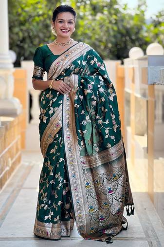 Green elegant art silk woven saree with rich zari border