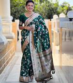 Green elegant art silk woven saree with rich zari border