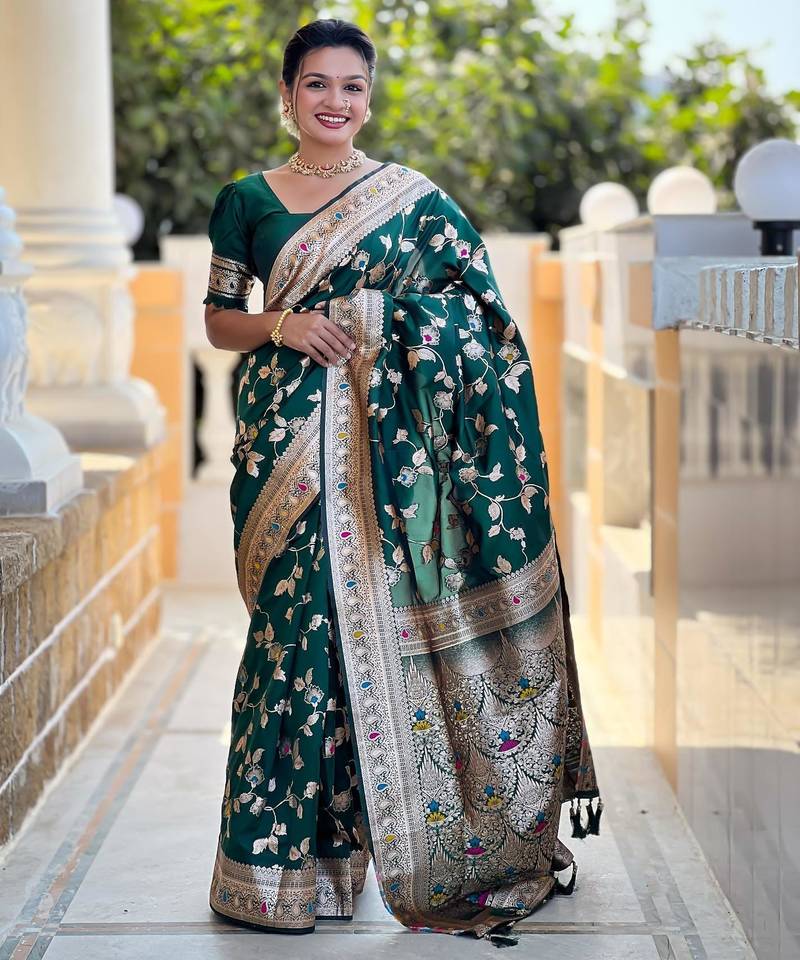 Green elegant art silk woven saree with rich zari border