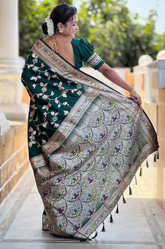 Green elegant art silk woven saree with rich zari border
