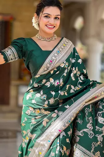 Green elegant art silk woven saree with rich zari border