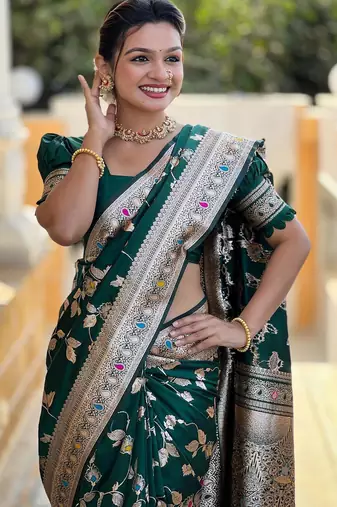 Green elegant art silk woven saree with rich zari border