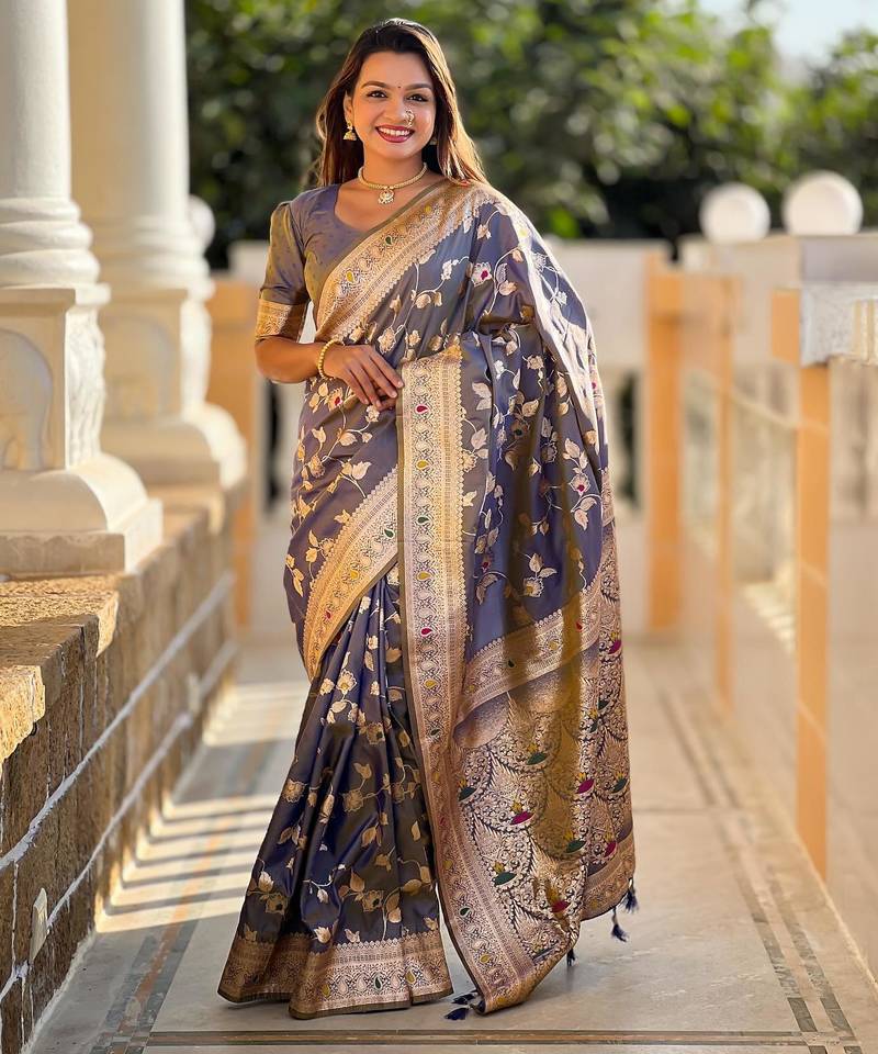 Grey elegant art silk woven saree with rich zari border