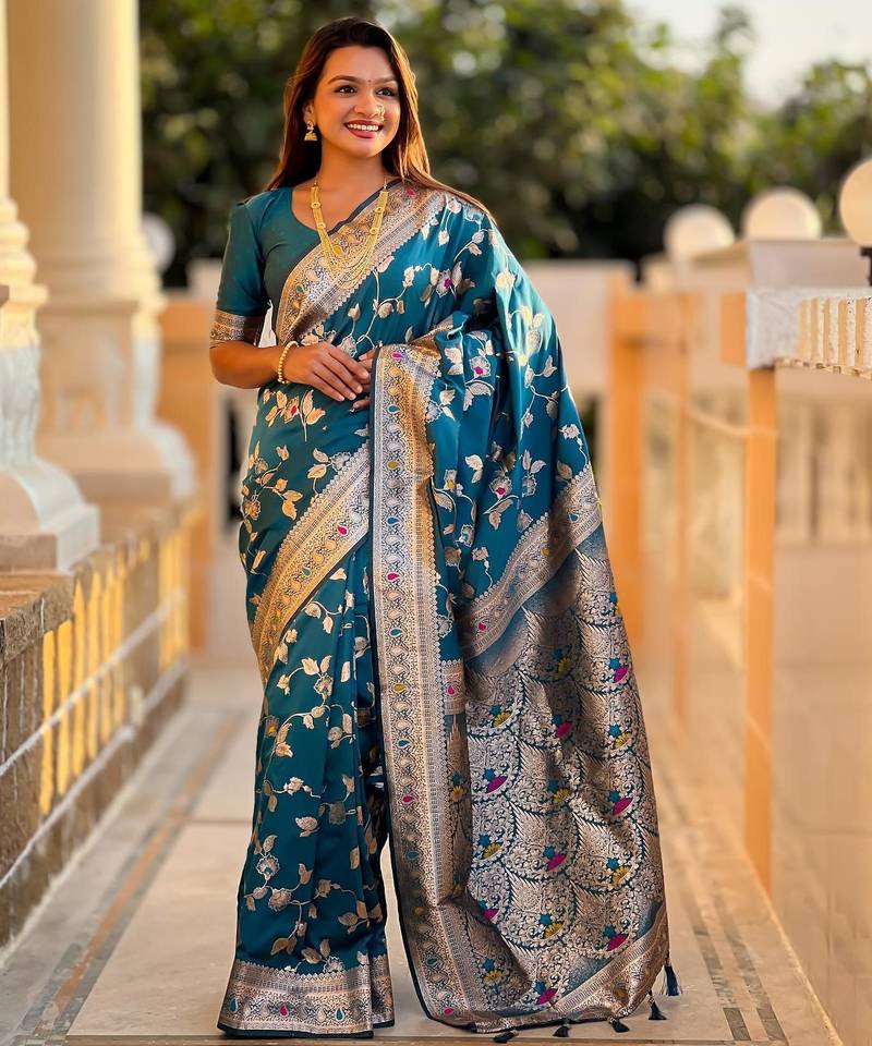 Turquoise elegant art silk woven saree with rich zari border