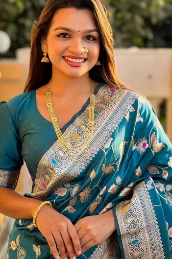 Turquoise elegant art silk woven saree with rich zari border