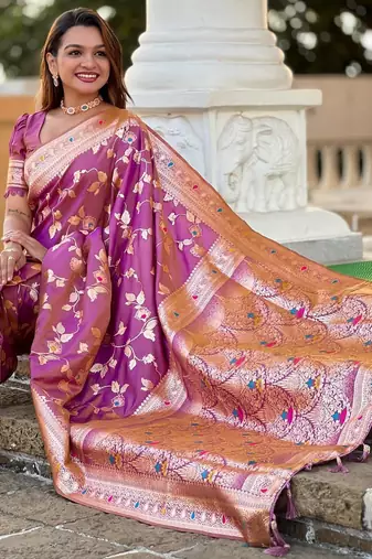 Onion pink elegant art silk woven saree with rich zari border