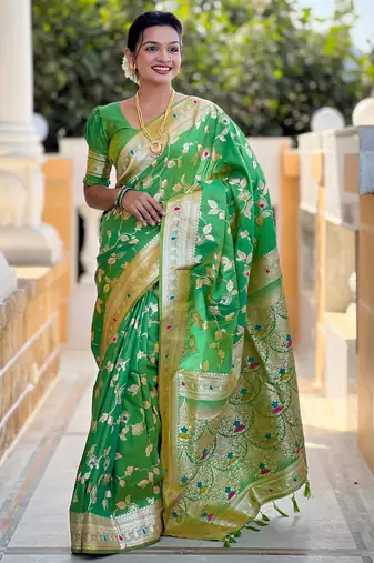 Green elegant art silk woven saree with rich zari border