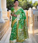 Green elegant art silk woven saree with rich zari border