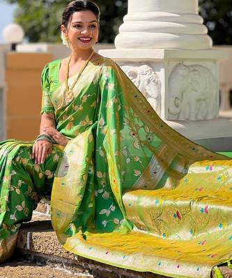 Green elegant art silk woven saree with rich zari border 5
