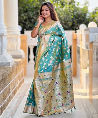 Green elegant art silk woven saree with rich zari border 2