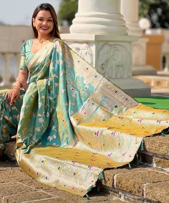 Green elegant art silk woven saree with rich zari border 5
