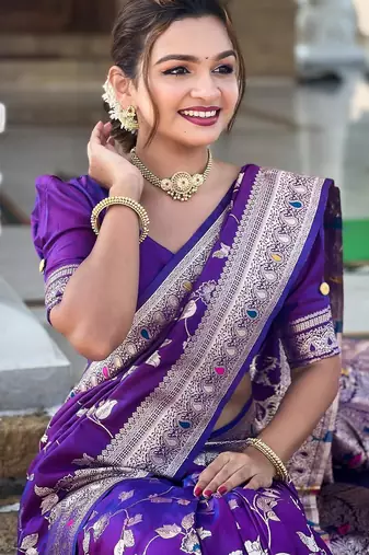 Purple elegant art silk woven saree with rich zari border