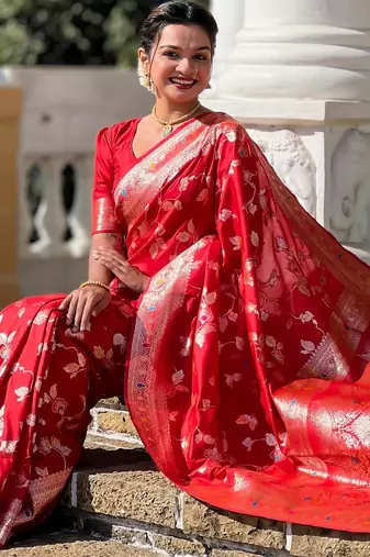 Red elegant art silk woven saree with rich zari border