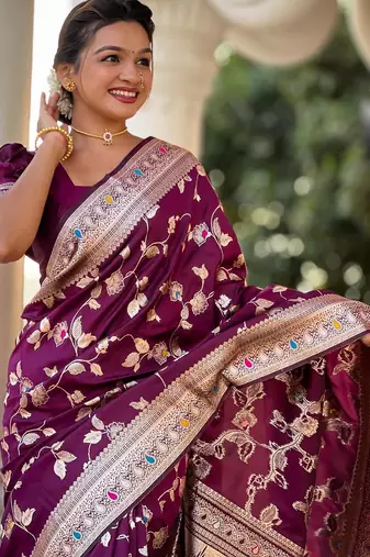 Wine elegant art silk woven saree with rich zari border